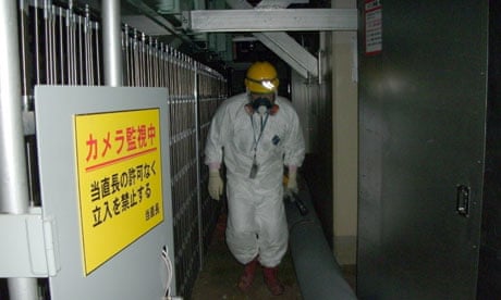 A worker inside the No 1 reactor building at Fukushima Daiichi nuclear power plant