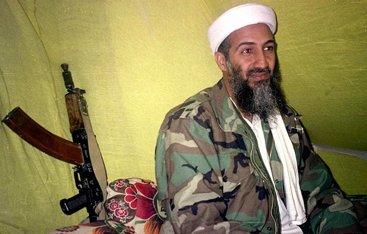 1998: Osama bin Laden at a meeting with reporters in the mountains of Helmand province, southern Afghanistan. By this time he was a suspect in the bombing of two US embassies in Africa Photograph: Rahimullah Yousafzai/AP