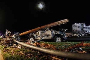 US tornado update: A damaged car in the parking lot of St. John's Regional Medical Centre