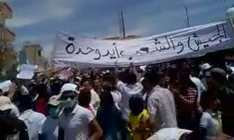 Pro-democracy demonstrators in Syria as seen in a YouTube video