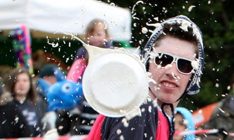 A competitor takes part in the World Custard Pie Championship