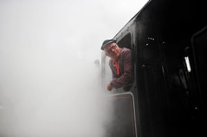 1940s re-enactment: A train driver leans out of the window