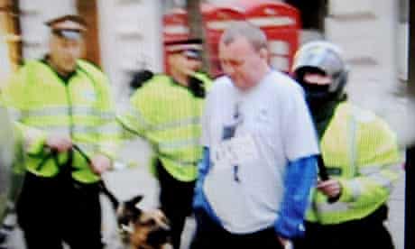 Ian Tomlinson being pushed by police officer