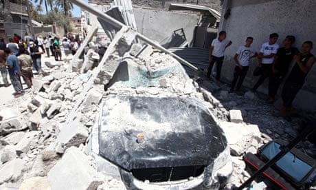 Rubble from a house and car in Tripoli claimed to have been hit by Nato bombs
