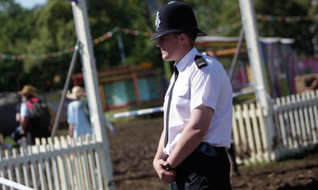 A policeman at the Glastonbury festival, where a body was found in a backstage area