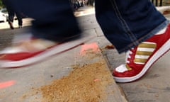 Person trips on pavement