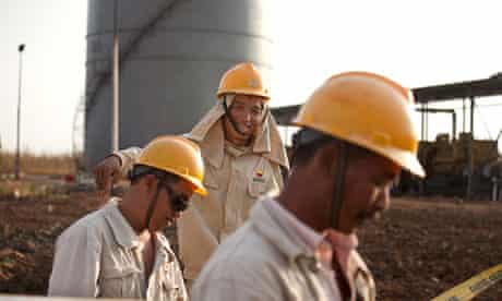 Workers for the China Petroleum Engineering & Construction Corp (CPECC) in Sudan