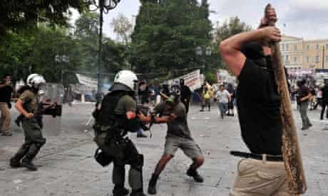 Protestors fight with riot police in Athens