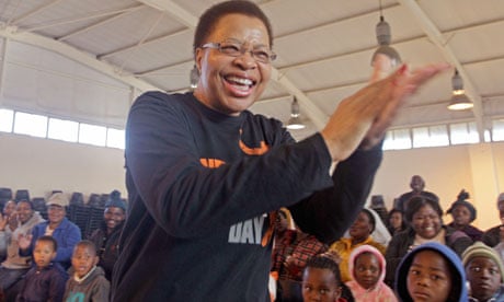 Nelson Mandela's wife, Graca Michel, claps as children sing Happy Birthday
