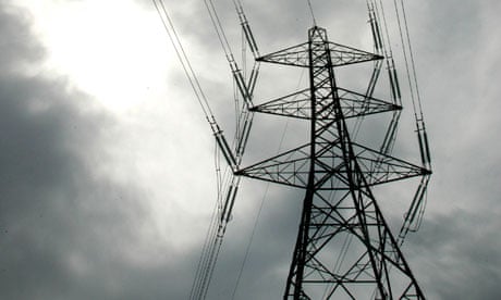 An electricity pylon is pictured near Cobham in Surrey, southern England