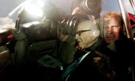 Rupert Murdoch is driven along Whitehall to attend a parliamentary committee hearing 