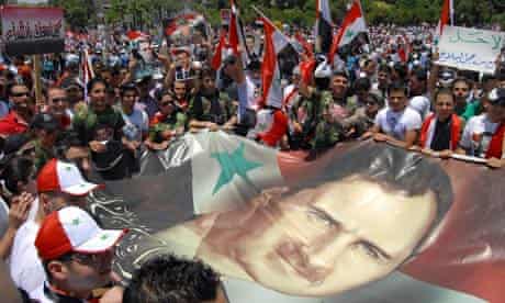 Syrians rally to support president
