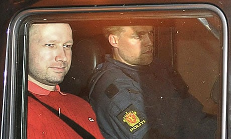 Anders Behring Breivik seen through the window of a police car