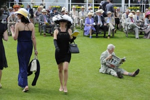 Glorious Goodwood Wed: Racing fan checks the form in the Racing Post
