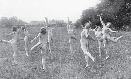 Women dancing naked in a field