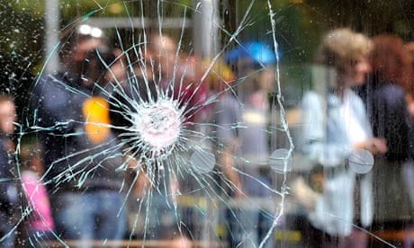 Broken window after London riots