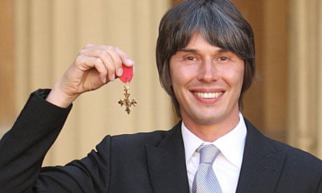 Professor Brian Cox with his OBE at Buckingham Palace on 20 October 2010
