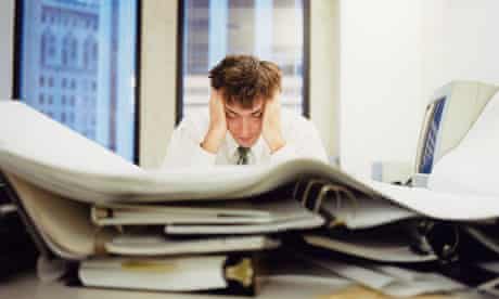 depressed office worker at desk