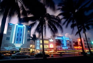 100 years of neon: Cars pass hotels on Ocean Drive