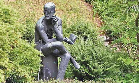 Sculpture of James Joyce beside his grave in Zurich