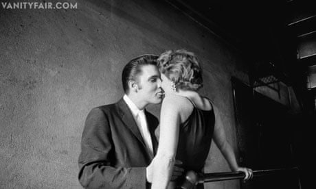 Elvis Presley kisses a woman