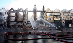 London riots day 4: Fire crews douse burnt out buildings on London Road in Croydon