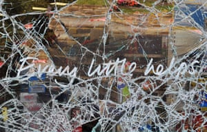 London riots day 4: The smashed windows of a Tesco supermarket in Haven Green in Ealing