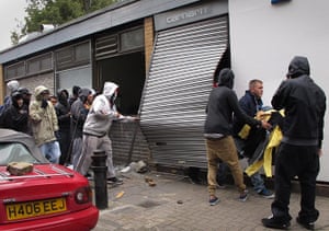 London Riots: Youths loot a Carhartt store in Hackney