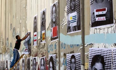 Palestinian portraits on the West Bank barrier