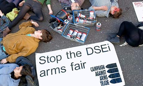 Protesters against the Defence and Security Equipment International fair
