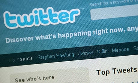 The Twitter homepage appears on a screen