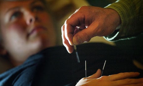 A patient undergoing acupuncture treatment