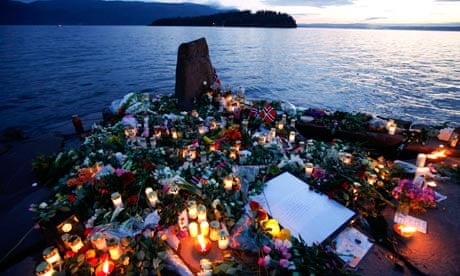 Flowers and candles at a temporary memorial on Utoya island