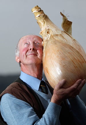 Giant vegetables: Gardener Peter Glazebrook poses with his world record breaking onion