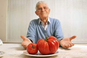 Giant vegetables: Antonio Martone with a giant 15-inch, 1lb beefsteak tomato he grew