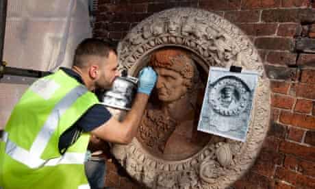 Hampton Court Palace roundels being restored