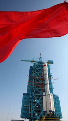 A Long March 2F rockey carrying China's Tiangong-1 space station module is awaiting lift-off