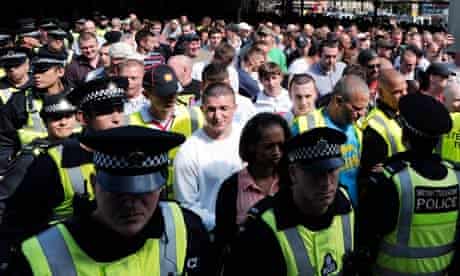 Members of the rightwing English Defence League wait to enter Kings Cross station