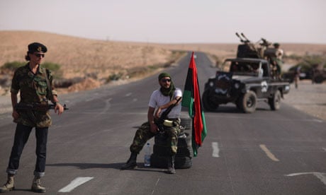 Libyan rebels at a checkpoint near Bani Walid
