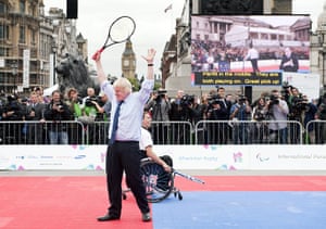 Cameron plays tennis : The Mayor celebrates winning a point