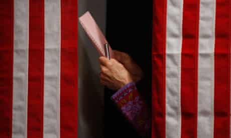 A voter checks her ballot in Balsams Hotel in Dixville Notch, New Hampshire