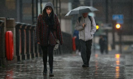 Depressed-looking woman in the rain