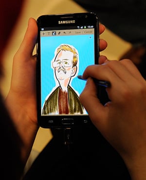CES 2012: An artist uses the Samsung's Galaxy Note at a Samsung booth 