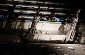 Costa Concordia: Firefighters climb on the luxury cruise ship leaning on its side