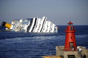 24 hours in pictures: The Costa Concordia cruise ship keeled after it was run aground, Italy