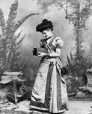 Kodak: 1895: A woman holds an early Kodak camera