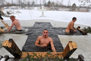 Orthodox Epiphany: Soldiers plunge into ice cold water to mark Orthodox Epiphany  in Bddelarus