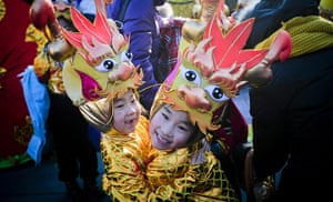 Chinese new year : Young performers dressed in dragon costumes play before their performance