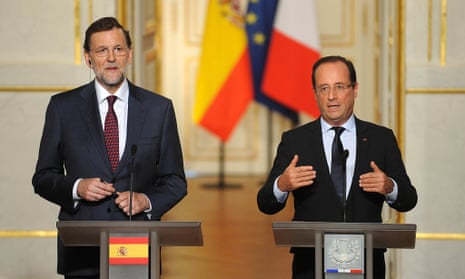 French President Francois Hollande (R) and Spanish Prime Minister Mariano Rajoy speak during a news conference at the Elysee Palace on October 10, 2012 in Paris, France.
