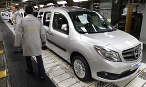 French carmaker Renault employees at its factory in Maubeuge, northern France October 8, 2012.